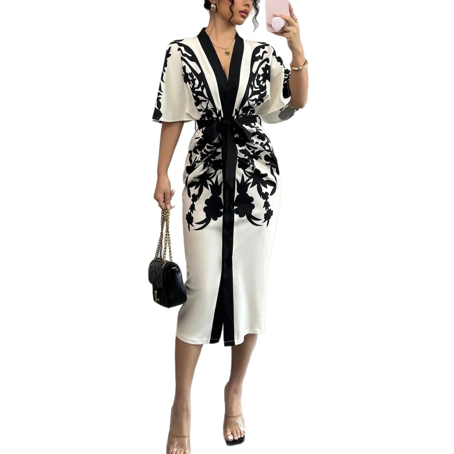 Robe élégante à motifs floraux avec ceinture