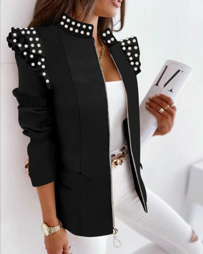 Veste élégante à motifs avec détails plissés aux épaules